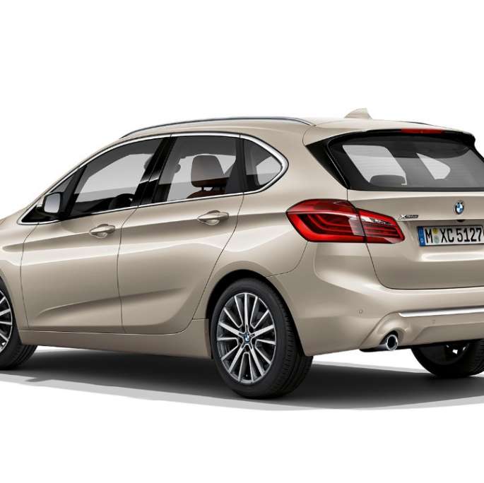 Three-quarter rear view BMW 2 Series Active Tourer Model Luxury Line BMW 2 Series Active Tourer Model Luxury Line 225i xDrive F45 Jucaro Beige metallic three-quarter rear view