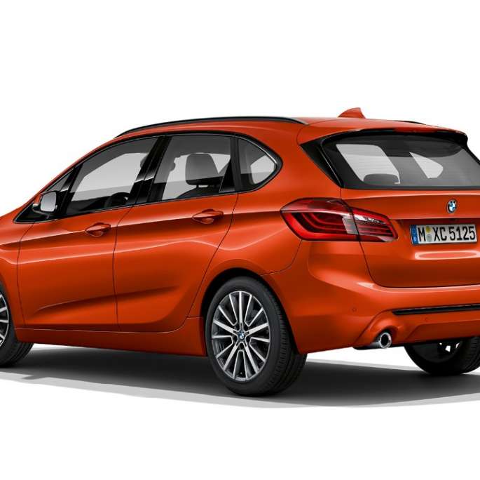 Three-quarter rear view BMW 2 Series Active Tourer Model Sport Line BMW 2 Series Active Tourer Model Sport Line 220i F45 Sunset Orange metallic three-quarter rear view