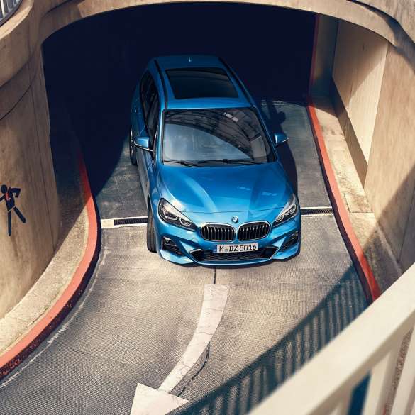 BMW 2 Series Gran Tourer driving in multi-storey car park BMW 2 Series Gran Tourer F46 2018 Estoril Blue metallic bird’s-eye view driving in multi-storey car park