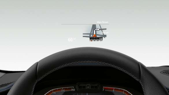 BMW 3 Series Sedan, BMW Head-Up Display. Frontal close-up of half the steering wheel and windscreen of the BMW 3 Series Sedan with BMW Head-Up Display.