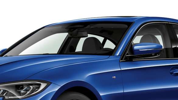 BMW 3 Series Sedan, BMW Acoustic glazing. Three-quarter side shot of the BMW 3 Series Sedan with focus on the front and driver side windows with Acoustic glazing.