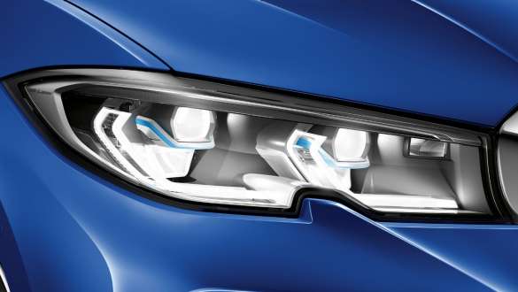 BMW 3 Series Sedan, BMW Laserlight. Lateral close-up of the left front headlight with BMW Laserlight.