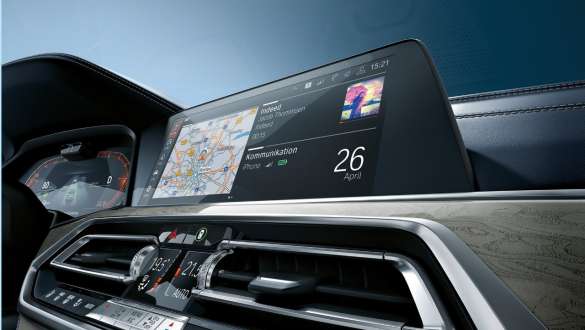 BMW X7 M Automobile with BMW Live Cockpit Professional Slanted low angle shot of the BMW Live Cockpit Professional of the BMW X7 M Automobile, G07