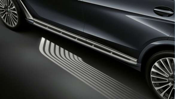BMW X7 M Automobile with Welcome Light Carpet BMW X7 M Automobile, Slanted top view, Welcome Light Carpet is projected onto the entrance area in front of the driver's door, G07
