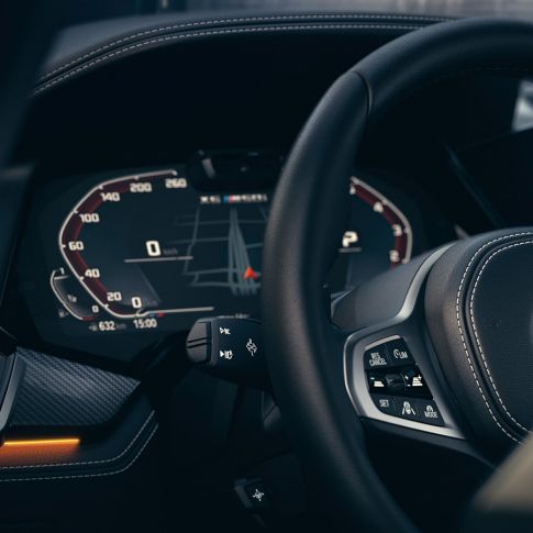 BMW assistance systems. Close-up of the BMW interior with focus on Instrument cluster.