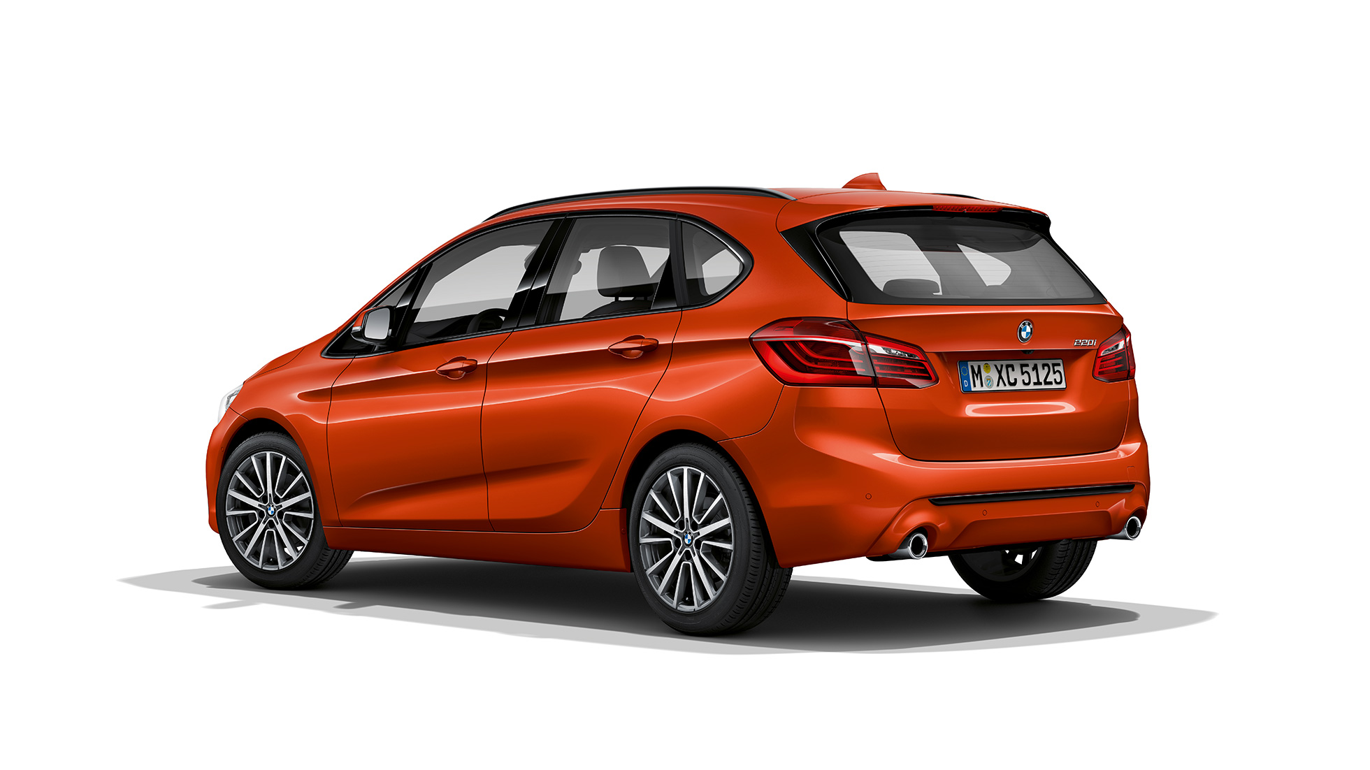 Three-quarter rear view BMW 2 Series Active Tourer Model Sport Line BMW 2 Series Active Tourer Model Sport Line 220i F45 Sunset Orange metallic three-quarter rear view