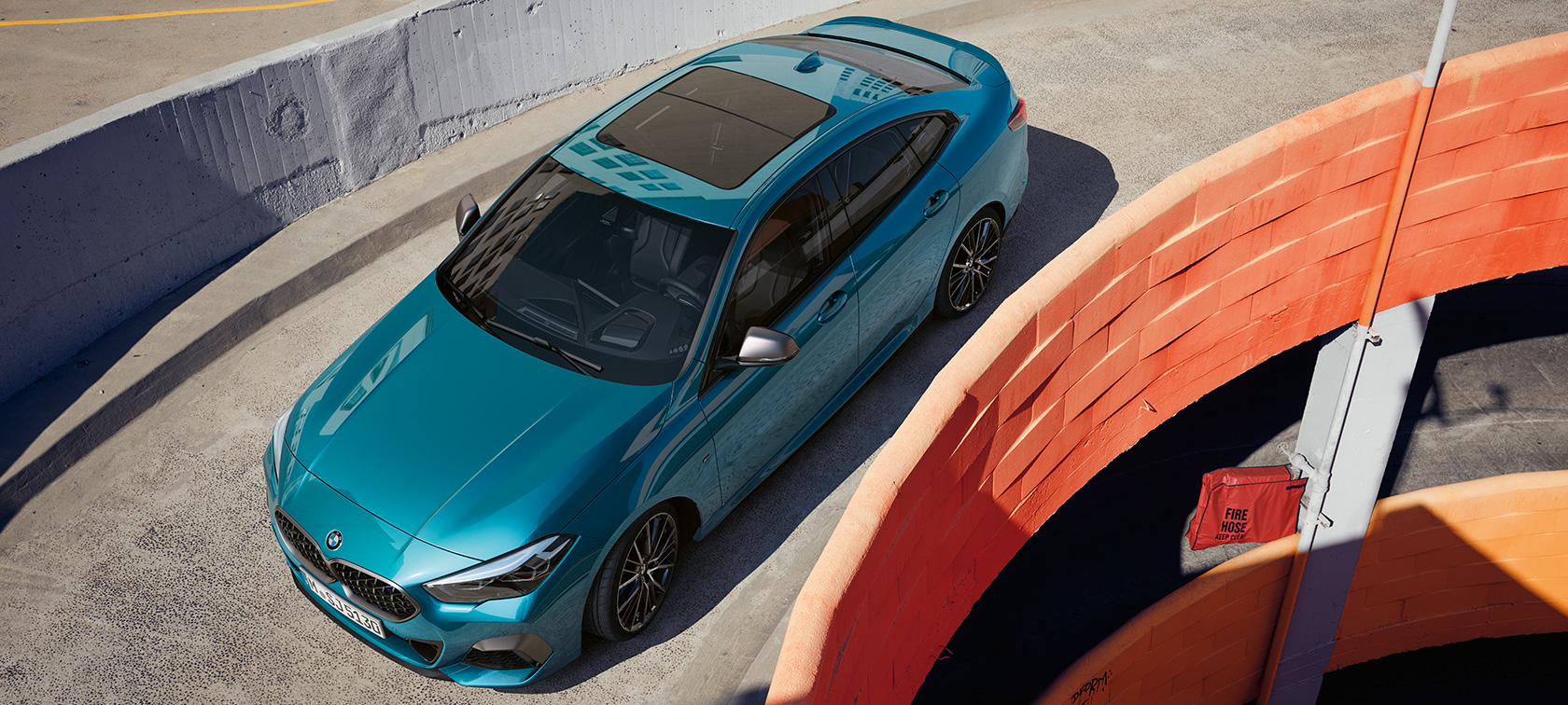 BMW 2 Series Gran Coupé with Panorama glass roof BMW 2 Series Gran Coupé with Panorama glass roof Snapper Rocks Blue metallic F44 bird's-eye view
