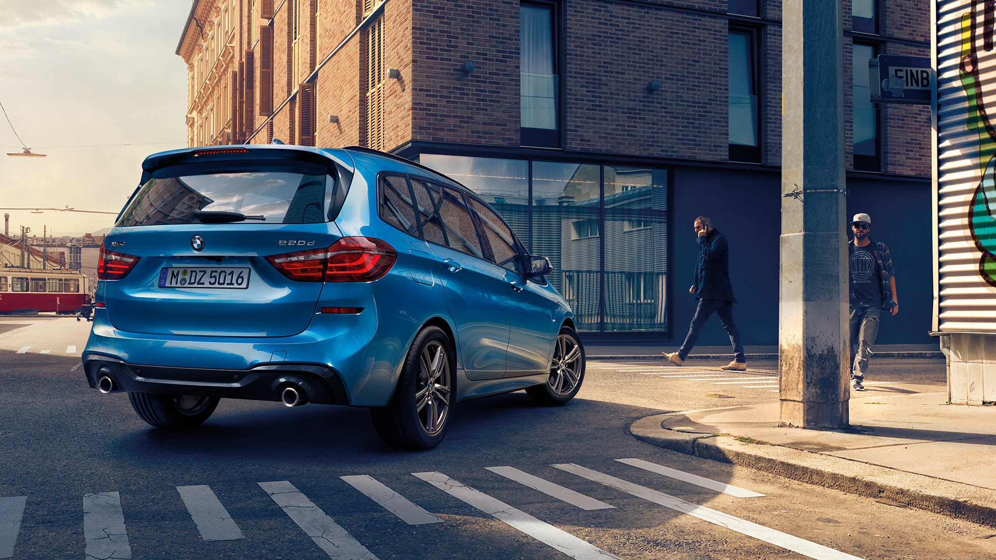 Exterior BMW 2 Series Gran Tourer Exterior BMW 2 Series Gran Tourer 220d xDrive F46 2018 Estoril Blue metallic three-quarter rear view driving downtown