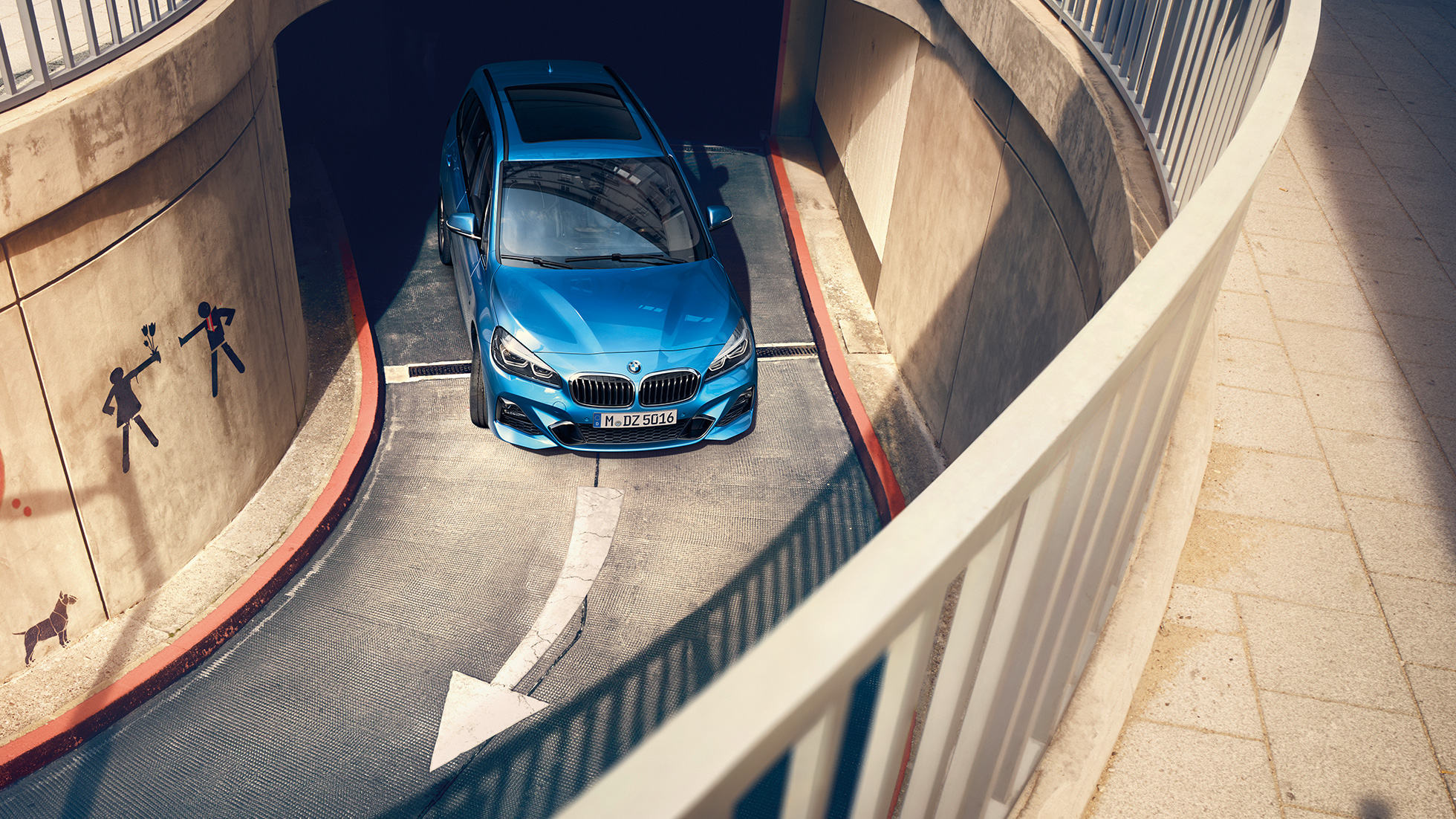 BMW 2 Series Gran Tourer driving in multi-storey car park BMW 2 Series Gran Tourer F46 2018 Estoril Blue metallic bird’s-eye view driving in multi-storey car park