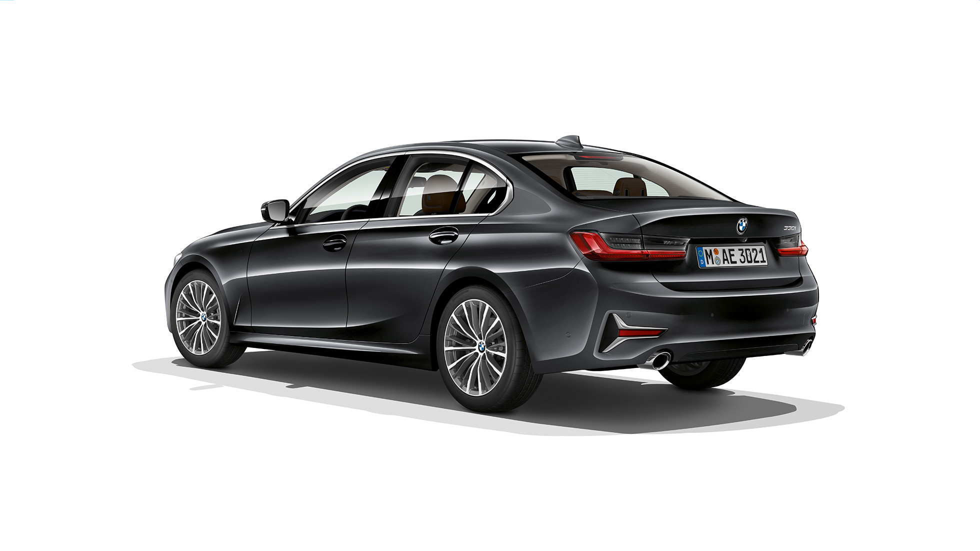 BMW 3 Series Sedan, Model Luxury Line rear. Three-quarter rear shot of the BMW 3 Series Sedan with Model Luxury Line features.