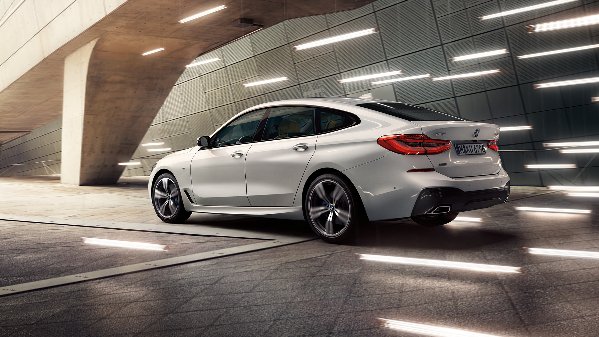 BMW 6 Series Gran Turismo G32 three-quarter side view from rear BMW 6 Series Gran Turismo G32 2017 Mineral White metallic three-quarter side view from rear