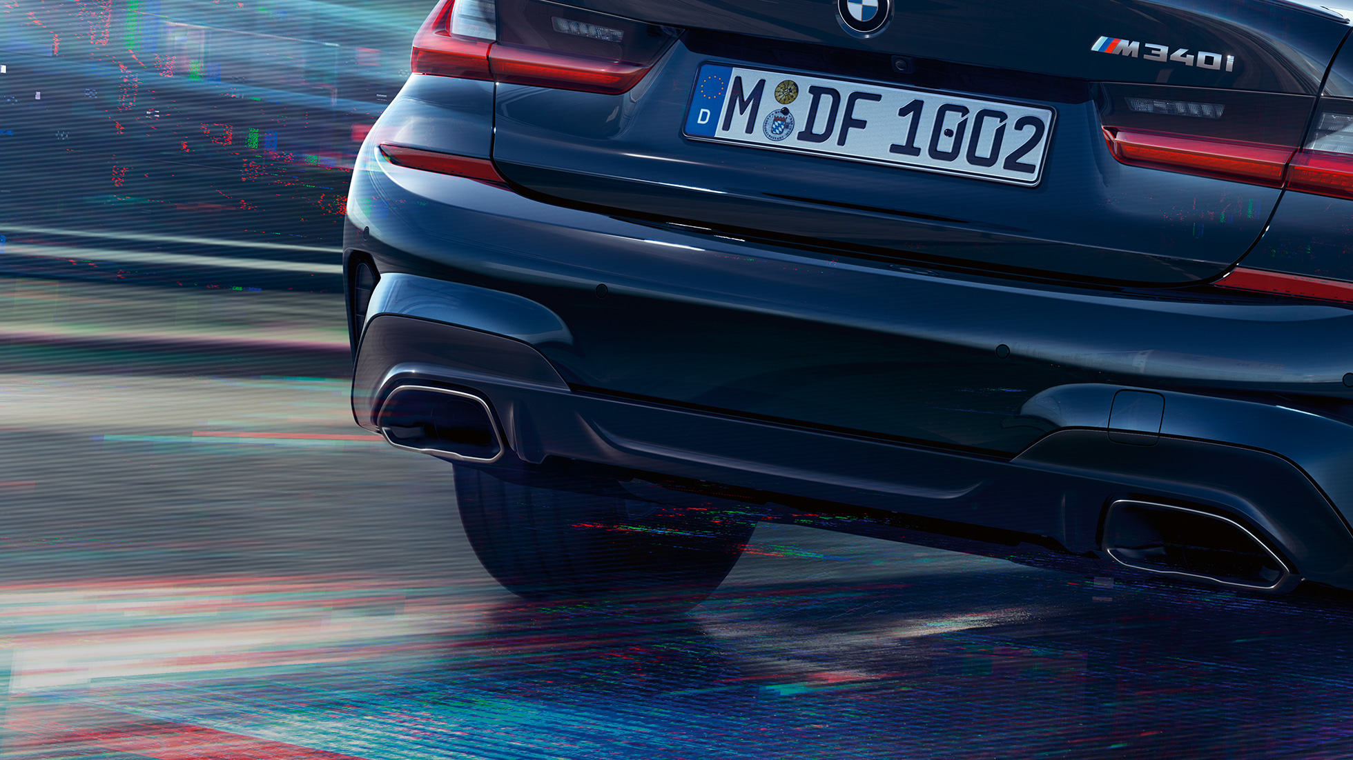 Tailpipe trims BMW M340i xDrive Sedan Tailpipe trims BMW M340i xDrive Sedan G20 Sapphire Black metallic close-up view