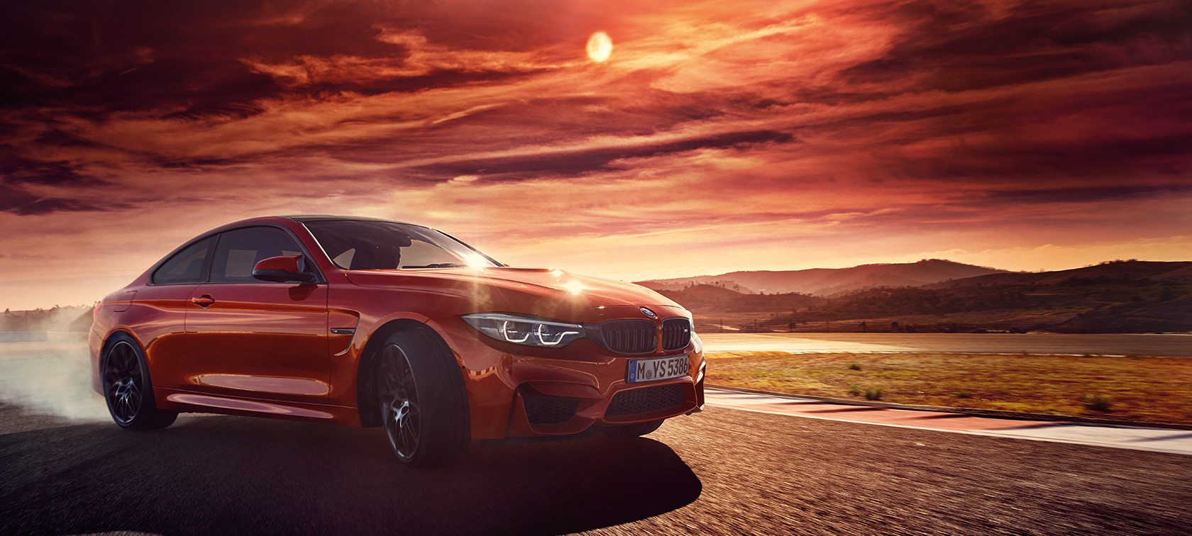 BMW M4 Coupé BMW M4 Coupé, side view during bend drift