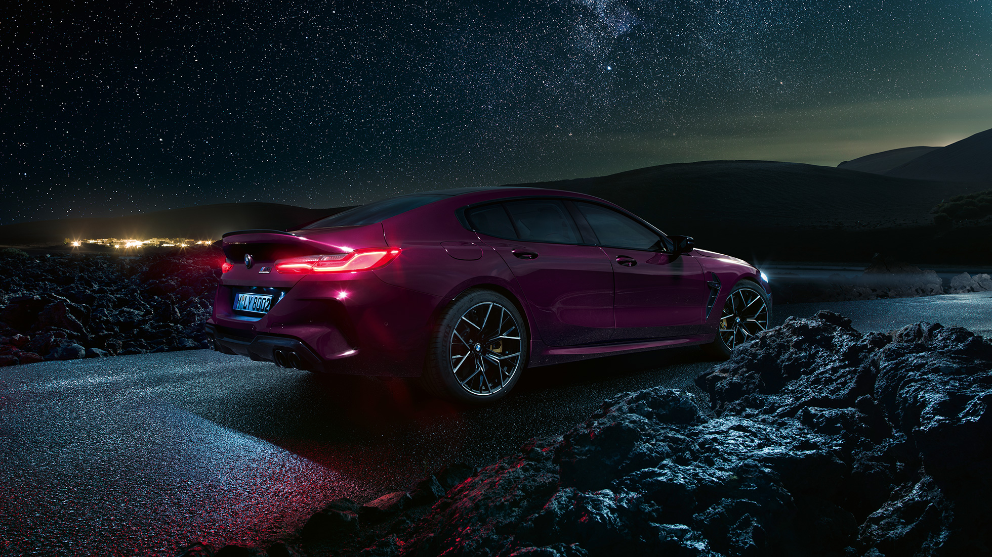BMW M8 Competition Gran Coupé three-quarter side view from rear BMW M8 Competition Gran Coupé F93 2020 BMW Individual Ametrine metallic three-quarter side view from rear