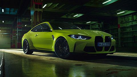 BMW M Series BMW M4 G82 three-quarter side view standing