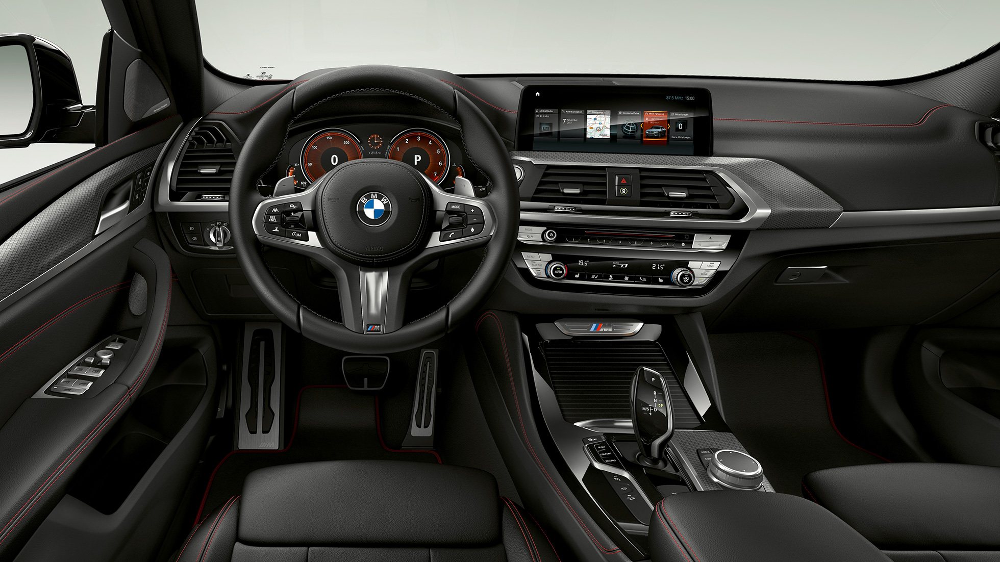 BMW X4 M40i, cockpit. BMW X4 M40i, interior, cockpit with M leather steering wheel and M Sport seats.