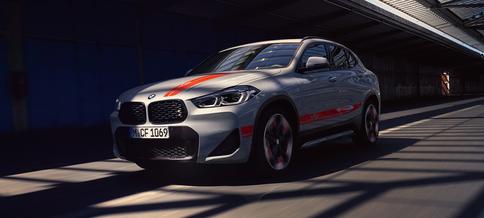 Three quarter front view BMW X2 F39 Three quarter front view BMW X2 2020 F39 Brooklyn Grey in motion