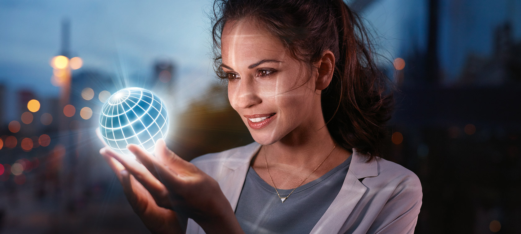 BMW ConnectedDrive Features Woman holds BMW ConnectedDrive globe in her hands