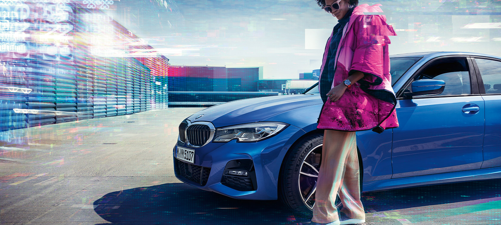Three-quarter front view BMW 3 Series Sedan BMW 330i Sedan G20 BMW 3 Series Sedan BMW 330i Sedan G20 Portimao Blue metallic three-quarter front view