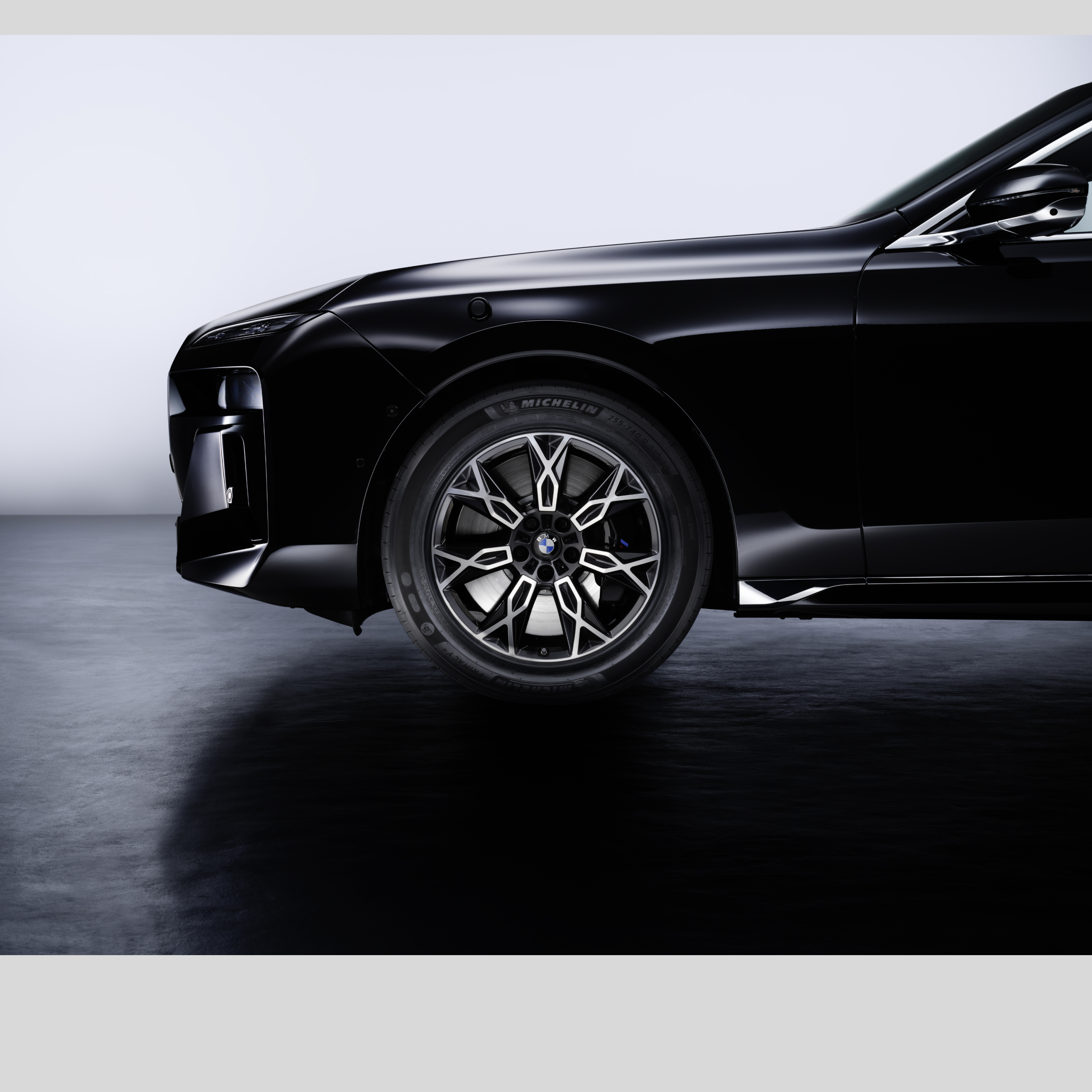 A BMW front wheel with close-up of tyre