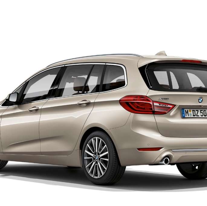 BMW 2 Series Gran Tourer 218d xDrive Model Luxury Line F46 2018 Jucaro Beige metallic three-quarter rear view 
